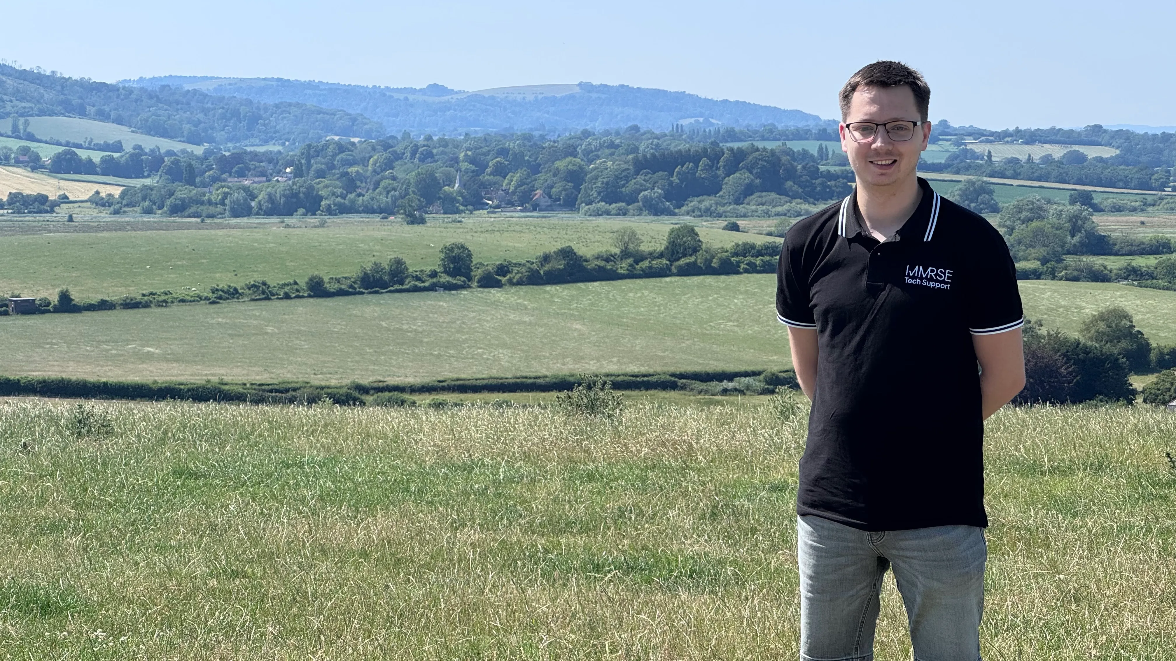 Chris from Immrse standing in the West Sussex countryside
